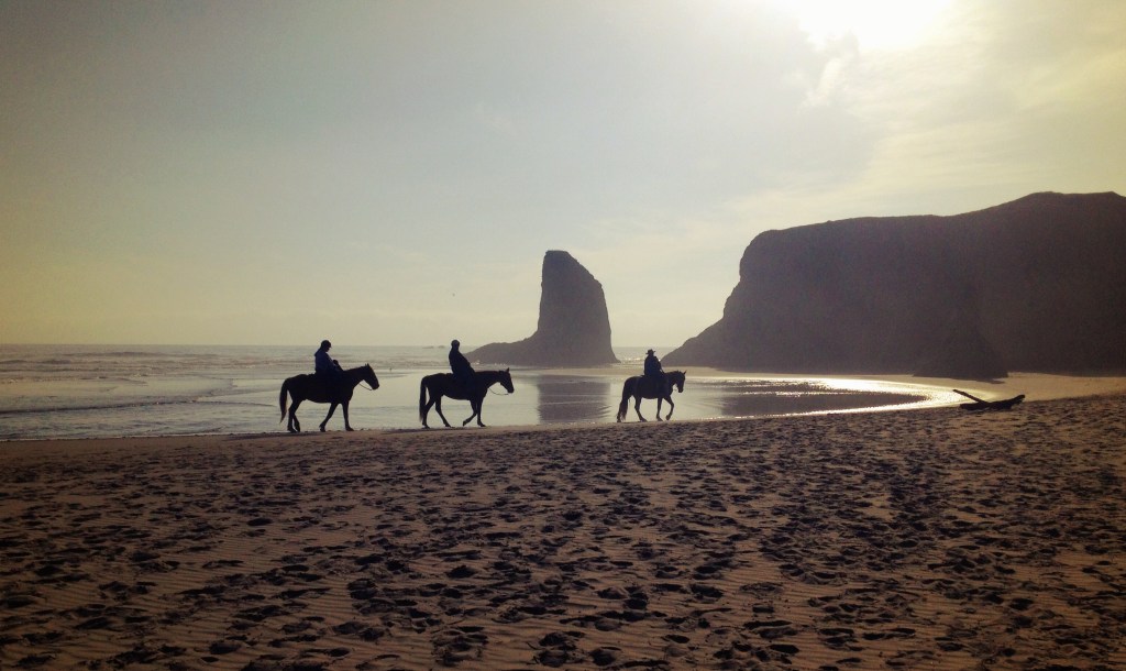 Riders enjoying their journey across the beach in Bandon, Oregon. Photo by Jaklyn Larsen